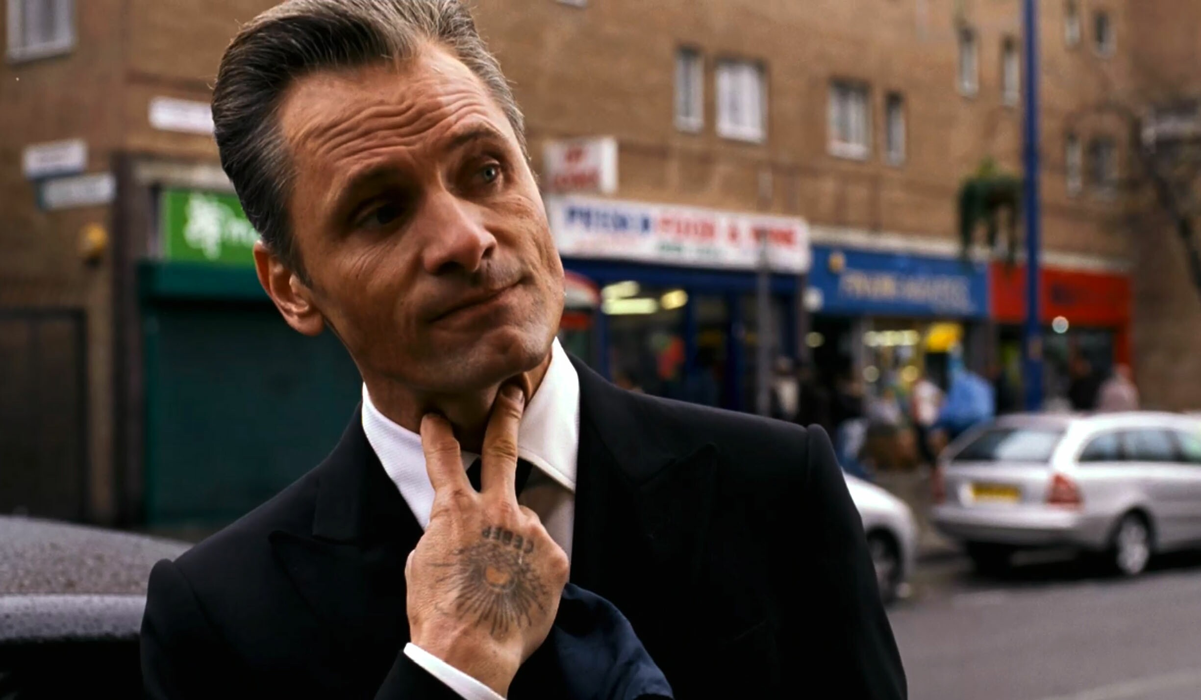 Here is Viggo Mortensen at his most menacing - covered in tattoos as a London mob boss. The actor plays the Eastern European leader of one of London's most notorious organized crime families in Eastern Promises. He soon butts heads with Anna, played by Naomi Watts, an innocent midwife who accidentally uncovers potential evidence against the crime family. The movie, reuniting Viggo with director David Cronenberg, also stars Vincent Cassel. Pictured: Viggo Mortensen Ref: SPL1134 Splash News and Pictures Los Angeles: 310-821-2666 New York: 212-619-2666 London: 870-934-2666 photodesk@splashnews.com Splash News and Picture Agency does not claim any Copyright or License in the attached material. Any downloading fees charged by Splash are for Splash's services only, and do not, nor are they intended to, convey to the user any Copyright or License in the material. By publishing this material , the user expressly agrees to indemnify and to hold Splash harmless from any claims, demands, or causes of action arising out of or connected in any way with user's publication of the material.